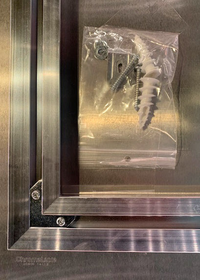 Zoomed image of aluminum panel metal rail mount, showing the rear of custom panel artwork